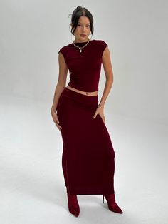 Body sculpting double lined midi skirt. Made with textured jersey spandex. Evening Midi Skirt In Elastane, Party Midi Length Elastane Skirt, Wine Red Skirt Outfit, High Neck Backless Top, Wine Red Skirt, Red Skirt Outfits, Knitted Midi Skirt, Cocktail Skirts, Bday Photoshoot