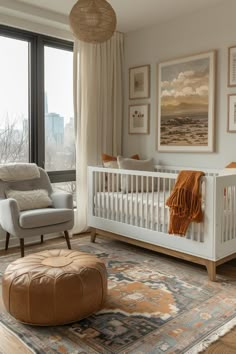 a baby's room with a white crib, rocking chair and large window