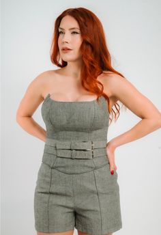 Introducing the epitome of edgy sophistication, our Gray Denim Corset is a daring statement piece designed to redefine your silhouette with bold elegance. Crafted with meticulous attention to detail, this corset is more than an accessory—it's an embodiment of confidence and style. Key Features: Sculpted Sophistication: The scoop neckline, featuring pointed sides at the bust line, adds a touch of avant-garde flair to elevate your look. Embrace the unexpected and make a bold statement. Metal Zippe Chic Boned Bodice Corset Belt For Night Out, Chic Fitted Corset Belt For Party, Luxury Fitted Corset Belt, Luxury Corset Belt, Modern Fitted Corset Belt For Party, Chic Strapless Corset Belt, Chic Fitted Corset Belt, Chic Fitted Corset Belt With Belt Loops, Trendy Fitted Corset For Date Night