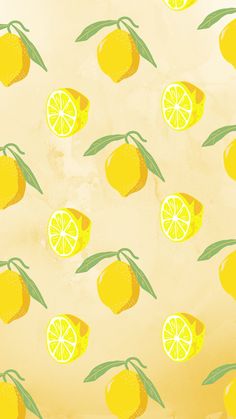 an image of lemons and limes on a yellow wallpaper background with green leaves