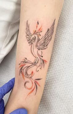 a person with a tattoo on their arm