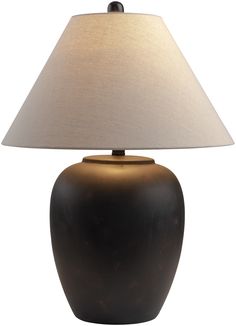 a lamp that is on top of a table with a white cloth shade over it