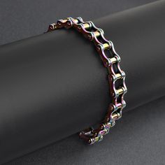 Description: Stainless steel rainbow bike chain bracelet. Approx. Weight: 33 grams Available Sizes: 7", 8", 9" Approx. Dimensions(mm): 7mm x 177.8mm(Length varies by SKU) Approx. Dimensions(Inches): 0.28" x 7"(Length varies by SKU) Rainbow Bike, Bike Chain Bracelet, Steel Bike, Biker Jewelry, Bike Chain, Jewelry Website, Rainbow Bracelet, Unisex Ring, Skull Ring