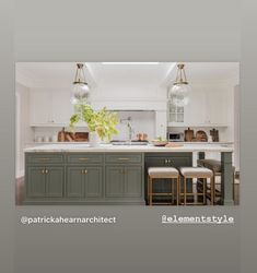 an image of a kitchen setting with stools in the center and countertop area