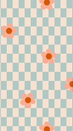 an image of flowers on a checkered tablecloth with pink and orange dots in the middle