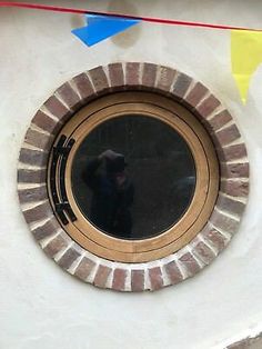 a round window on the side of a building