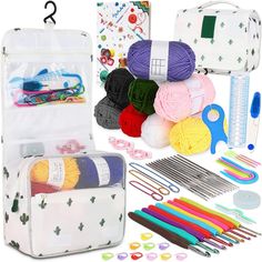 an assortment of crafting supplies including yarn, scissors and knitting needles