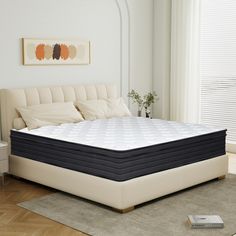 the mattress is made up and ready to be used in the bedroom or living room