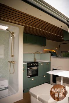 Green kitchen in van life van with shower and seating Campervan Interior Colour Schemes, Citroen Relay Campervan, Citroen Relay Campervan Conversion, Small Boat Interior Ideas, Cardroom Green, Van Conversion With Shower, Van Life Bathroom, Campervan Renovation, Van Conversion Floor Plans