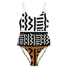 This African Print Swimsuit One-Piece Kuba is a unique and luxurious addition to your swimwear collection. The vibrant and bold African print is expertly crafted into a one-piece design, providing both style and comfort. Make a statement at the beach or pool with this exclusive swimsuit. Product Features Please Compare your Measurements To our Size Chart Before Purchase • 82% Polyester, 18% Spandex• Fabric weight: 6.61 oz/yd² (224 g/m²)• Chlorine-resistant fabric• Cheeky fit with a scoop necklin African Print Swimsuit, Indoor Outdoor Bathroom, Trendy Activewear, Skirt Swimsuit, Midi Flare Skirt, Canvas Decor, Midi Skirt Pencil, Print Swimsuit, Swimwear Collection