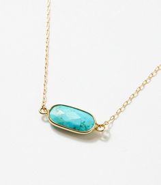 Effortlessly transition from everyday wear to special occasions in this subtle and low-profile genuine turquoise necklace. The gold bezel setting not only enhances the beauty of the turquoise but also adds a luxurious touch to the overall design. Dimensions: 7.5-9.5" adjustable length, pendant size 1 cm Material: 14k gold-filled, lead and nickel-free chain Weight: 0.52oz Lobster clasp closure Handmade in USA Turquoise And Gold Necklace, Turquoise And Gold Jewelry, Turquoise Bar Necklace, Aqua Necklace, Turquoise Bar, Modern Jewellery, Turquoise And Gold, Classy Jewelry, Karen Kane