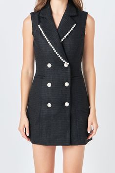 Channel elegance and sophistication with our Pearl Trim Sleeveless Dress. Made with high-quality tweed fabric, this blazer dress will elevate your style instantly. The mini length adds a touch of playfulness, while the collar and lapel add a touch of refinement. But what sets this dress apart is the delicate pearl trim detail that adds a hint of luxury to your outfit. Perfect for any occasion, this dress is a must-have for the fashion-forward woman. Tweed Blazer dress Mini length Collar and lapel Sleeveless Double breast Pearl button Pearl trim detail at lapel Lining Hand wash cold Do not bleach Do not tumble dry Iron low Shell: 100% Polyester Lining: 100% Polyester HN3351D Total length: 33.25" Bust: 35" S Tweed Blazer Dress, Lapel Collar Dress, Capsule Outfits, Tweed Dress, Blazer And Shorts, Tweed Fabric, Heat Styling Products, Fit Dress, Tweed Blazer