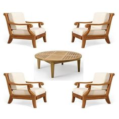 four wooden chairs and a table with white cushions