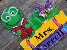 a paper cut out of the letter m is for mr's turtle on a wooden table