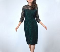 Vintage 1960s evening dress with a black lace illusion body, lined in sheer beige (upper) and emerald green. Well worn with signs to show (be sure to check the condition section). Would look lovely as a display piece (on a mannequin or hung on the wall). Hate to see such a pretty piece go to waste! ✈ Measurements ✈ * Taken from SEAM to SEAM with garment lying flat *  Shoulder to Shoulder * 14.5" Bust * 18" Sleeve * 11" Waist * 13.5" Hips * 19.5" Length * 41.5" ✈ Specifics ✈ Label: -- Tagged Size Bright Pink Dresses, Cheap Cocktail Dresses, Cocktail Dresses Online, Beauty Spot, Blue Shift Dress, Boho Midi Dress, Minimalist Dresses, Illusion Dress, Evening Wedding