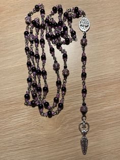 Purple/Black Mother & Tree Rosary  26 3/4" Total Length (15 1/2" Necklace Part) Please see photos for more detail  Thanks for looking Purple Cross Necklace, Purple Beaded Rosary As Gift, Purple Rosary, Rosary Necklace Black Gold, Black Rosary Necklace, Alternative Earrings, Purple Cross, Black Beaded Cross-shaped Rosary, Digital Closet