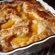 a close up of a pie in a pan on a table