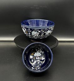 two bowls sitting on top of each other