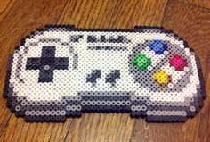 a piece of lego art made to look like a video game controller