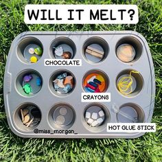 a muffin tin filled with chocolate, crayons, hot glue stick and candy