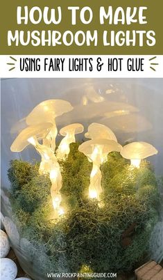 some fairy lights are in a glass bowl with moss and rocks on the bottom, and text overlay how to make mushroom lights using fairy lights & hot glue