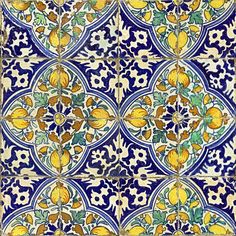 an artistic tile design with lemons and leaves on blue ground, in the style of portuguese tiles