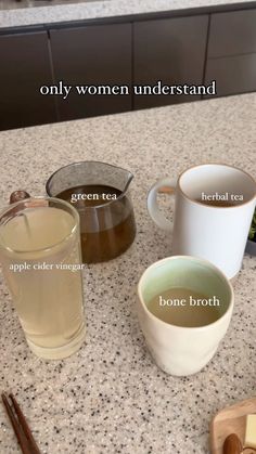 there are many different types of teas on the counter top, including green tea and bone broth