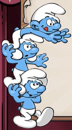 the smurfs are standing in front of a white board with a red curtain