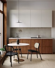 the kitchen is clean and ready to be used as a dining room or office space