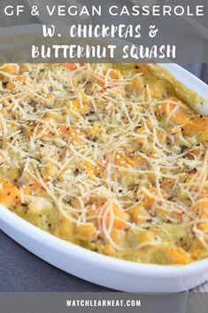 a casserole dish with cheese, chicken and butternut squash in it on a table