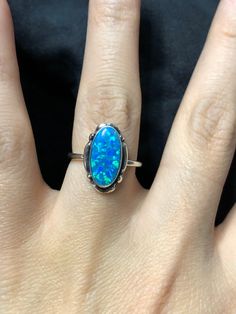 Fire blue Opal ring/ opal jewelry/ stunning opal ring/ blue opal jewelry / fire opal ring/handmade jewelry/ Made in USA lab created opals Stone length: 14mm Stone width: 8mm Blue Oval Cabochon Opal Ring, Dark Blue Jewelry, Blue Opal Jewelry, Fire Opal Jewelry, Fire Blue, Blue Opal Ring, Inlay Jewelry, Fire Opal Ring, Ring Opal