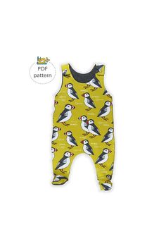 a baby's yellow bird print romper with black trims on the bottom