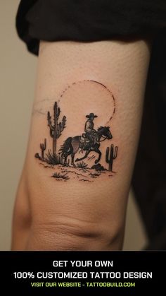 a tattoo with a cowboy riding a horse in the desert