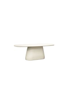 an oval white table on a white background