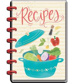 the recipe book is open and has vegetables in it