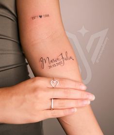 a woman's arm with a tattoo that says married and two hearts on it