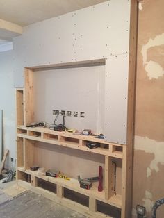 the room is being remodeled and ready to be used as a workbench area