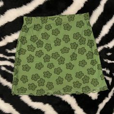 Green Floral Mini Skirt. Never Worn & Couldn’t Return. Skirt Is Lined And Has An Elastic Waistband. Size M. Casual Green Mini Skirt For Spring, Trendy Green Mini Skirt For Spring, Y2k Lined Skirt For Spring, Green Retro Skirt For Summer, Trendy Green Lined Skort, Green Pencil Mini Skirt For Summer, Trendy Green Skort For Spring, Trendy Green Flowy Mini Skirt, Trendy Green Lined Skirt