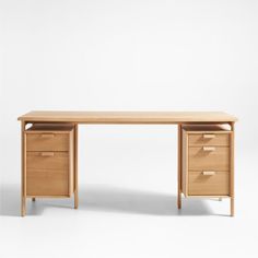 a wooden desk with two drawers on each side and an open drawer at the top