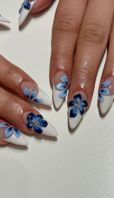 nailsbyaleeshah on ig Blue Nails With Simple Design, Blue Nails Ideas Winter, Blue Flowers Nails Design, Builder Gel Flower Nails, Dark Blue Nail Inspo Acrylic, Winter Flower Nails, Tropical Blue Nails, Blue Nail Inspired, Gender Nails Ideas