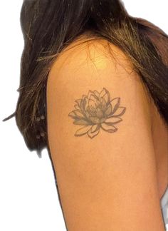 a woman with a tattoo on her arm