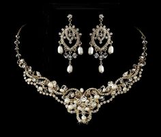 a necklace and earring set with pearls