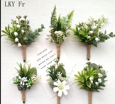 six boutonniers with flowers and greenery on them