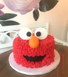 the cake is decorated like an elmo face