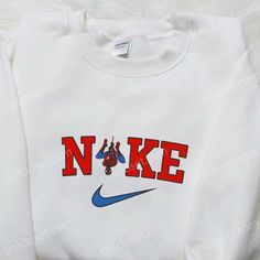 The Spider-Man x Nike Movie Embroidered Sweatshirt is the ultimate must-have for any Marvel fan. This sweatshirt features a sleek design with the iconic Spider-Man logo embroidered on the front. Made from high-quality materials, it offers both comfort and style. Perfect for casual outings or cozy nights in, this sweatshirt will keep you warm and [...] Nike Christmas, Nike Cartoon, Grinch Baby, Nike Inspired, Grinch Stuff, Nike Stuff, Baby Grinch, Hello Kitty Sweatshirt, Vanellope Von Schweetz