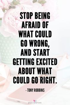 a pink flower sitting on top of a desk next to a keyboard and mouse with a quote above it that reads, stop being afraid of what could go wrong