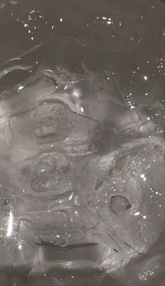 an image of water that is very close to the surface and looks like it's melting