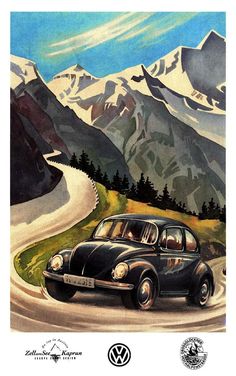 an old black car driving down a mountain road