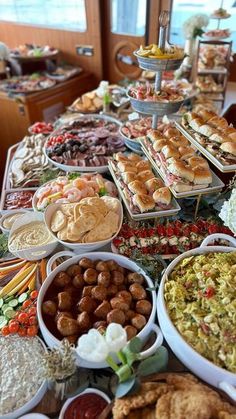 a buffet table filled with different types of food