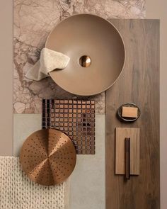 an overhead view of a sink and accessories on the wall in a bathroom with marbled flooring